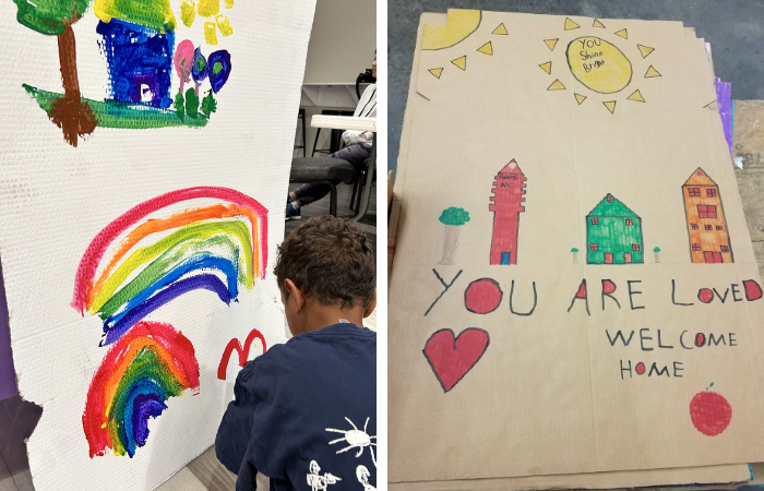 Children decorate baffles for Habitat Homes