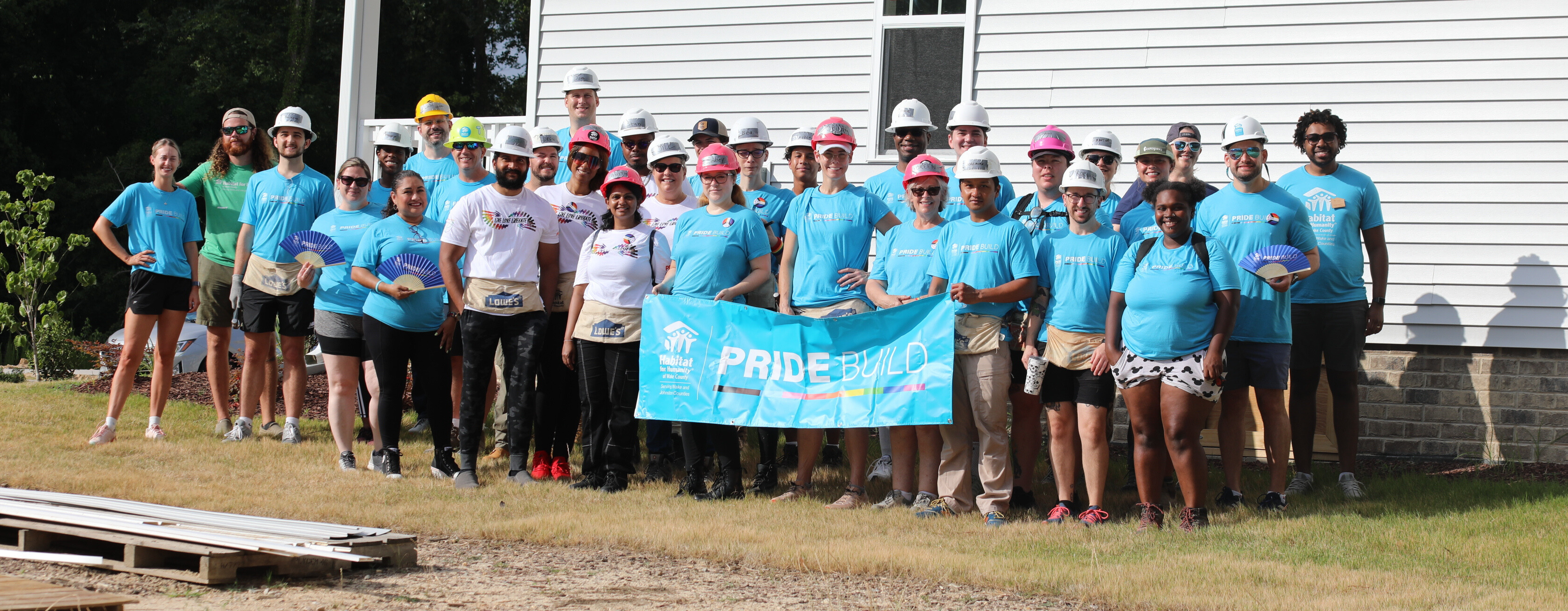 Group of volunteers at Pride Build day in Raleigh, N.C.