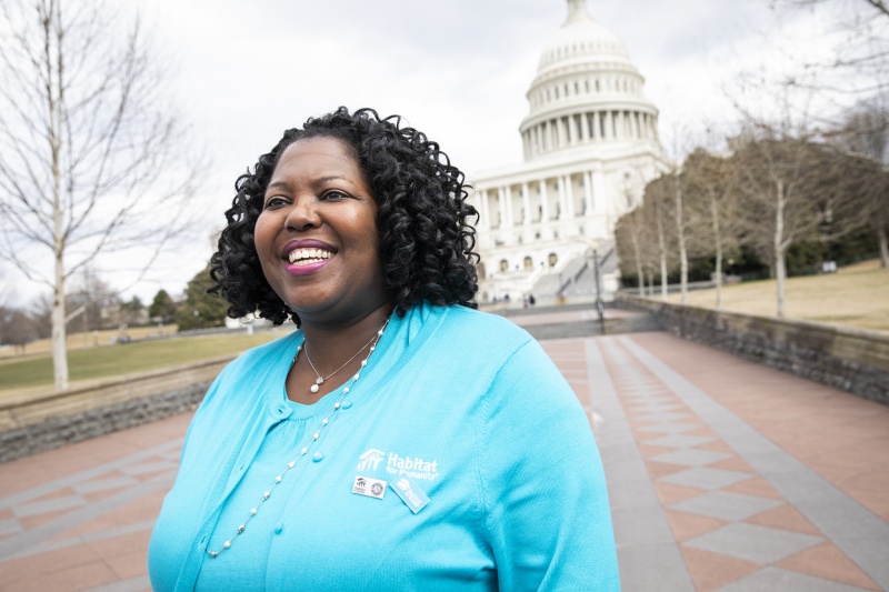 A woman in front of Capitol Hill